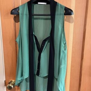 Must Have Sleeveless Sheer Green Blouse with Black Trim